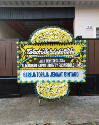 Papan Bunga Duka di Muara Sentosa